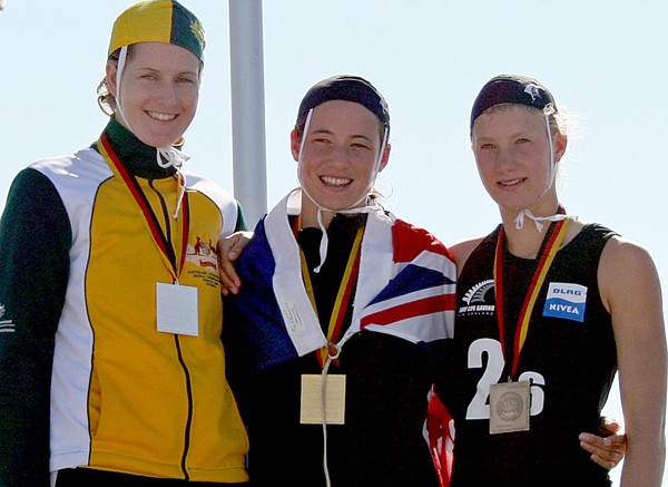 New Zealand's Nikki Cox (centre) and Chelsea Maples (right) get their gold and bronze board race medals, with Australia's Alicia Marriott at the world lifesaving championships in Germany. 